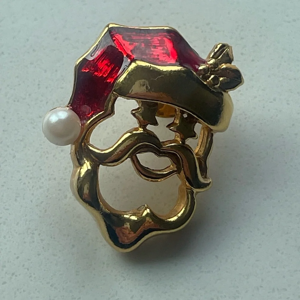 Vintage Avon Santa Claus gold tone pin brooch